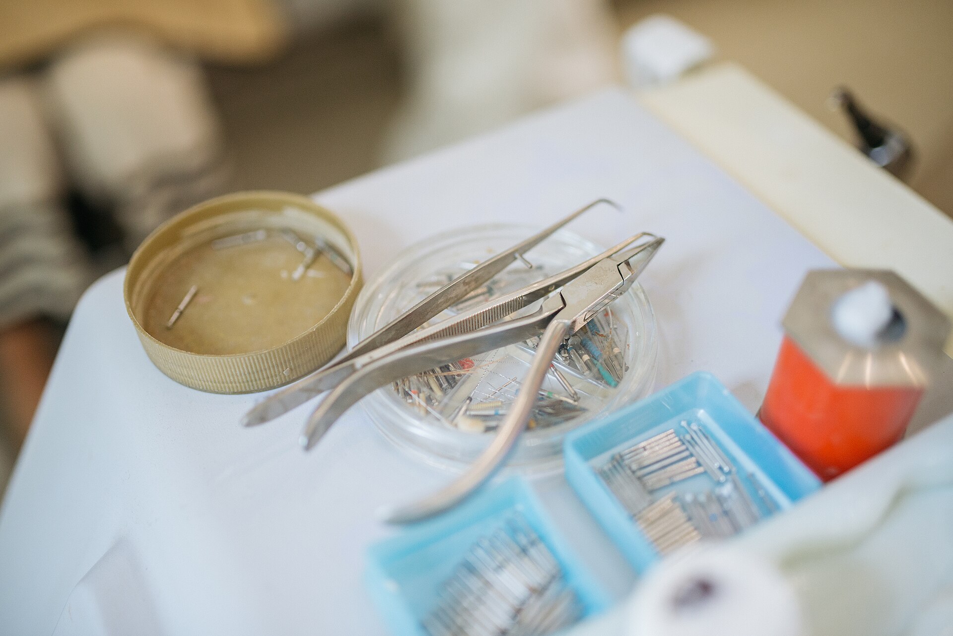 Dental instruments laid out on a tray in a clinic